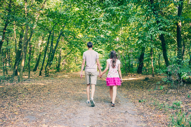 Couple walking in the park - Photo, image
