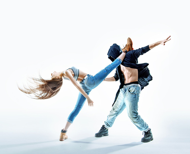 Two athletic dancers making a performance - Фото, изображение