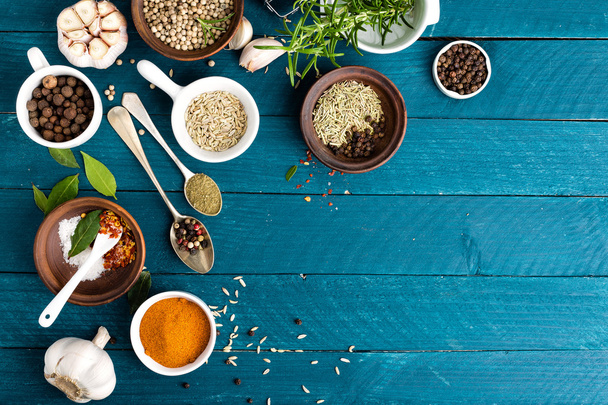 culinary background with spices on wooden table - 写真・画像