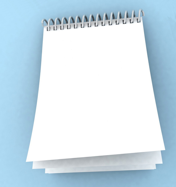 Un cuaderno en espiral en blanco sobre fondo azul
 - Foto, Imagen