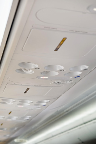 Italy, airplane cabin with no smoking sign on - 写真・画像