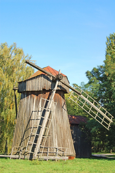 Antique wooden windmill - Φωτογραφία, εικόνα