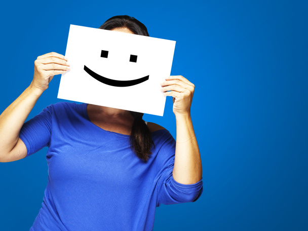Woman with happy emoticon - Photo, Image