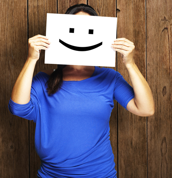 Woman with happy emoticon - Foto, Bild