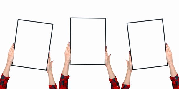 Female hands holding blank boards isolated on white - Valokuva, kuva