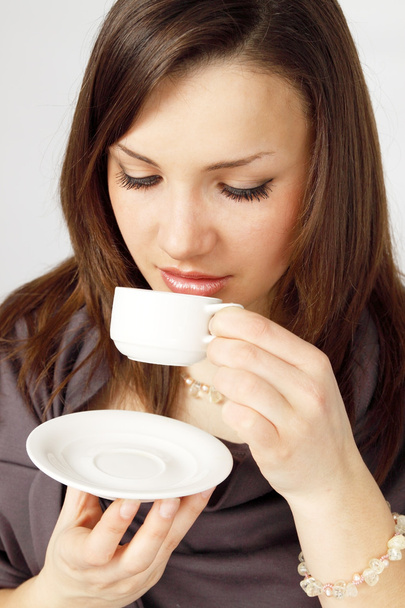 Woman drinking coffee - Foto, imagen