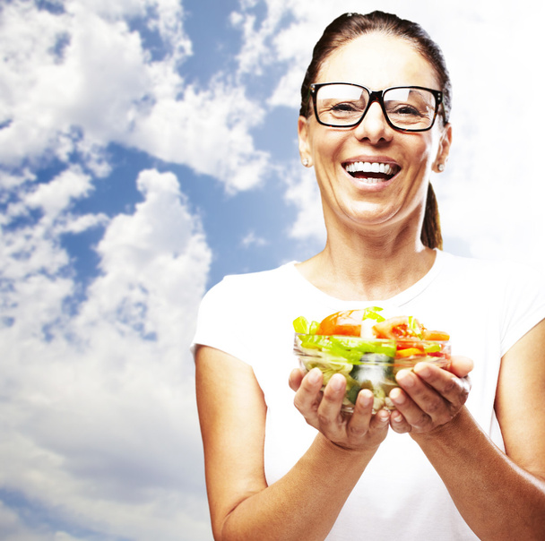 Woman holding salad - Photo, Image