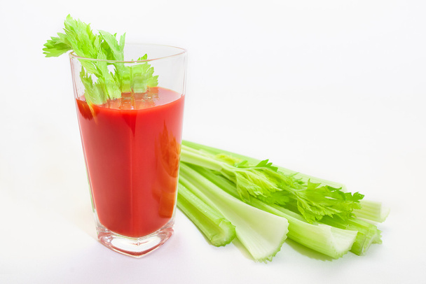 Glass of tomato juice with selery and tomatoes - Photo, Image