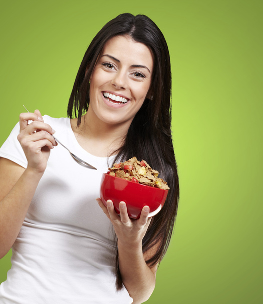 Woman holding a bowl with cereals - Photo, Image