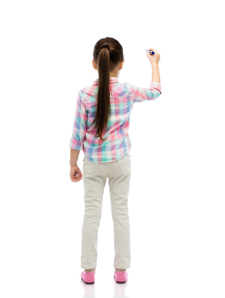 little girl drawing or writing with marker - Фото, зображення