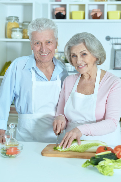 senior man and woman  in the kitchen - 写真・画像