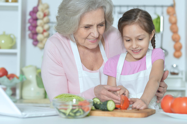 Senior woman with granddaughter cooking - Φωτογραφία, εικόνα
