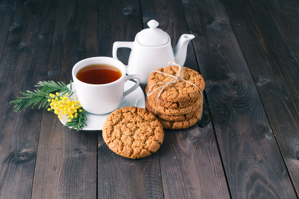 tea cup with sweet cookie - Foto, Imagen