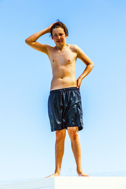 Cute boy posing on a roof - Zdjęcie, obraz