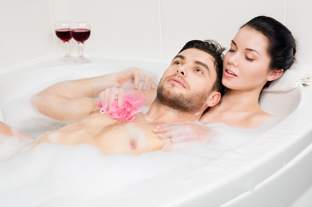 beautiful couple is taking a bath - Photo, Image