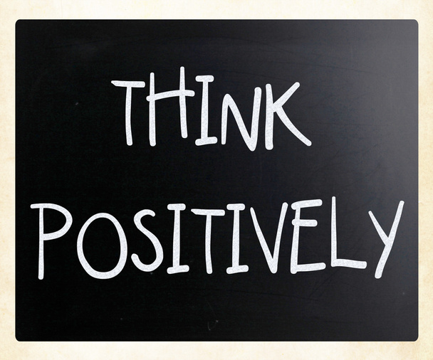 "Think Positively" handwritten with white chalk on a blackboard - Photo, Image