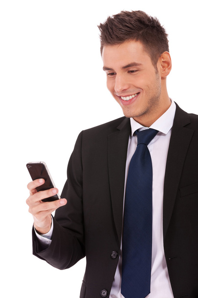 Uomo d'affari che legge un SMS
 - Foto, immagini