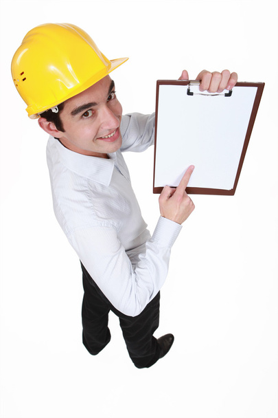 Businessman pointing at a notepad - Foto, Bild