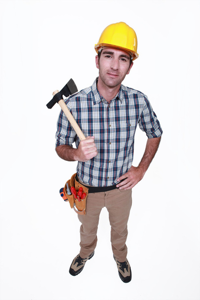Tradesman holding a hatchet - Photo, Image