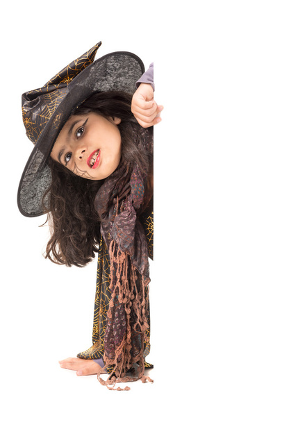 girl in Halloween witch costume - Foto, afbeelding
