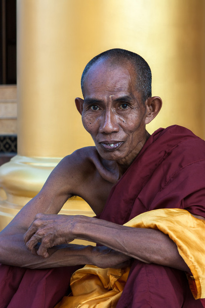 Yangon, Burma. November 26, 2011: Portrait of a monk in the Shwedagon - Zdjęcie, obraz