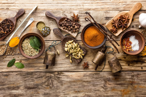various spices on wooden background - Foto, imagen