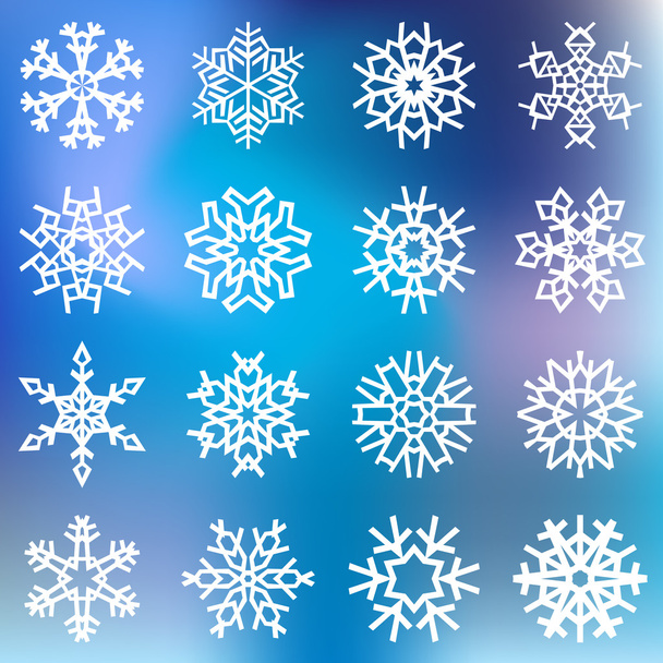 White snowflakes on blue blurred background - Vetor, Imagem