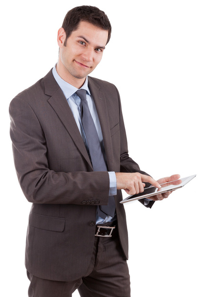 Young caucasian businessman using a tablet pc - Fotografie, Obrázek
