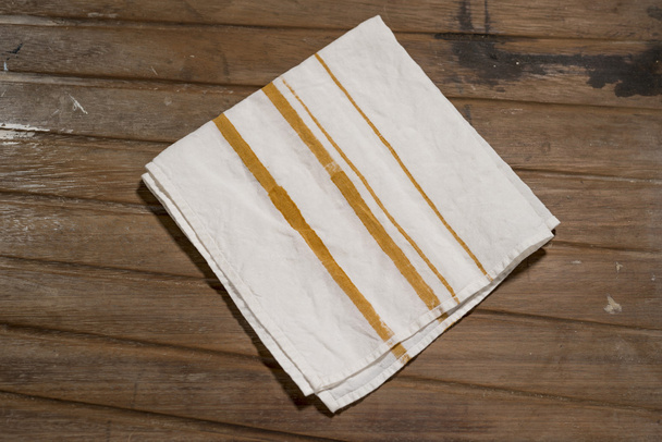 White Dinner Napkin with Orange Thick and Thin Bands - Photo, Image
