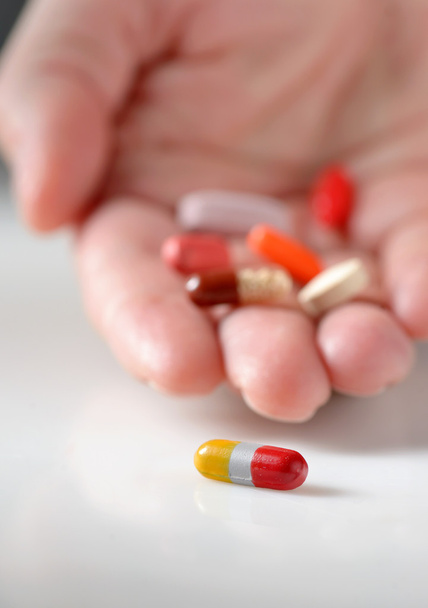 Pills in hand, close-up - Photo, Image