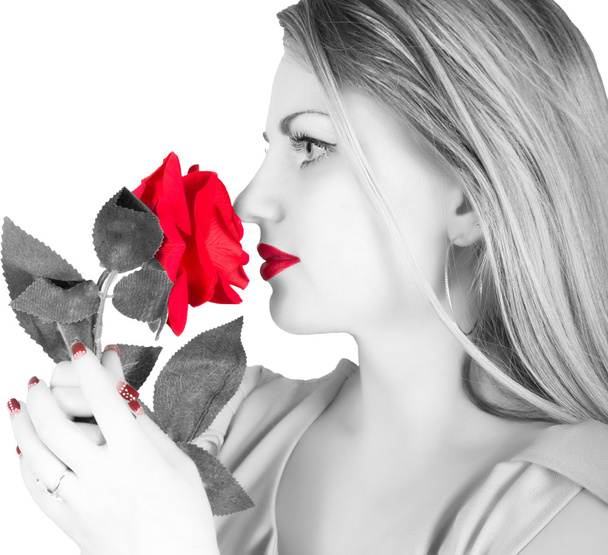 beautiful woman in a pink blouse, on a shoulder of a red rose. isolated on white background. black and white - Φωτογραφία, εικόνα