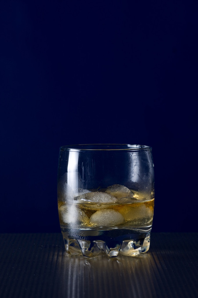 Glass of whiskey and ice - Photo, image