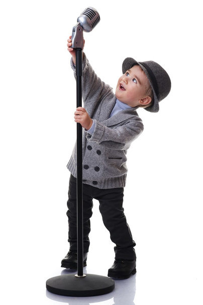 Baby boy with a microphone - Фото, зображення