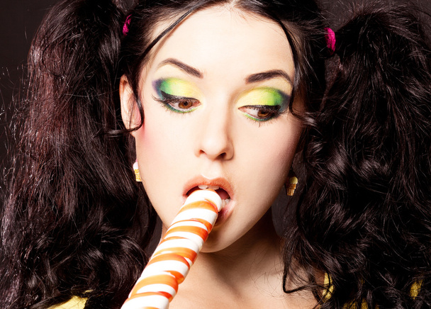 Woman with lollipop - Φωτογραφία, εικόνα