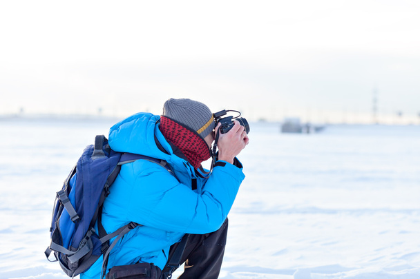 photographer in the winter landscape - Photo, image