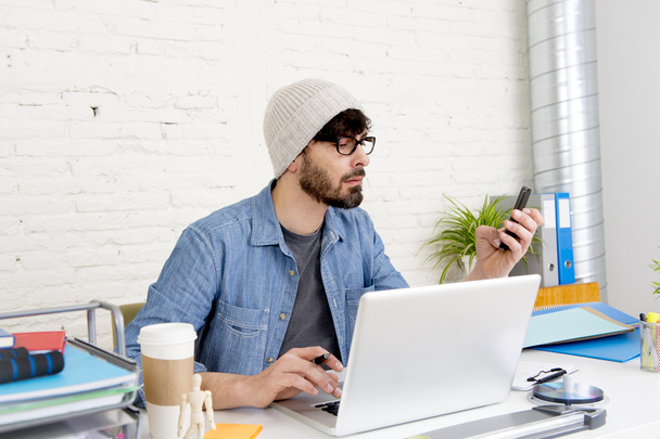 corporate portrait of young hispanic attractive hipster businessman working at modern home office - Photo, Image