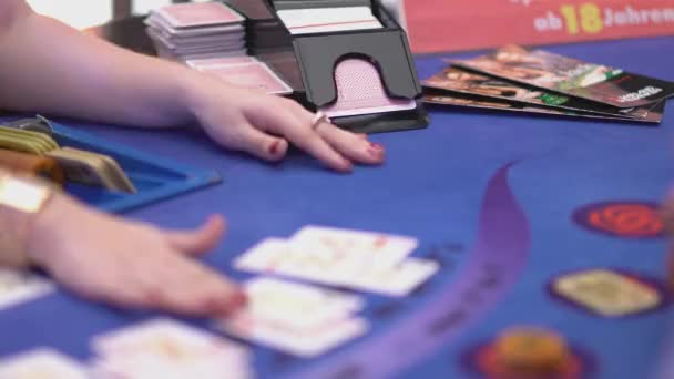 Gambling Black Jack in a casino - adding cards from a sled - Materiał filmowy, wideo