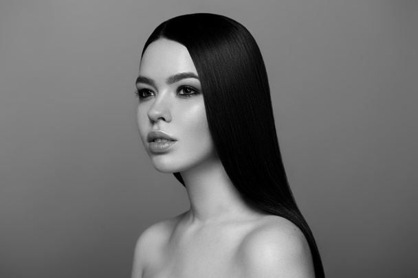 Beautiful Young Woman with Long shiny hair. The Black-and-white  - Valokuva, kuva