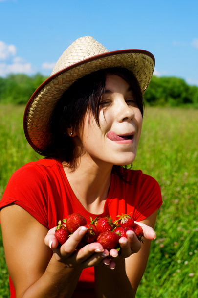 Young beautiful girl with strawberry - Foto, Bild