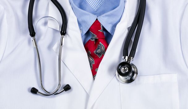 Doctor lab coat with dress shirt and stethoscope - Photo, image