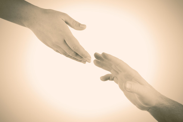 Two hands reaching each other - Фото, зображення