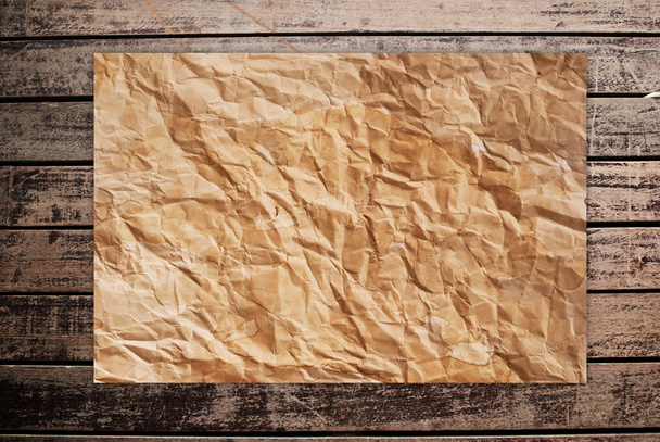 Vintage paper on the classic wooden texture background. - Fotografie, Obrázek