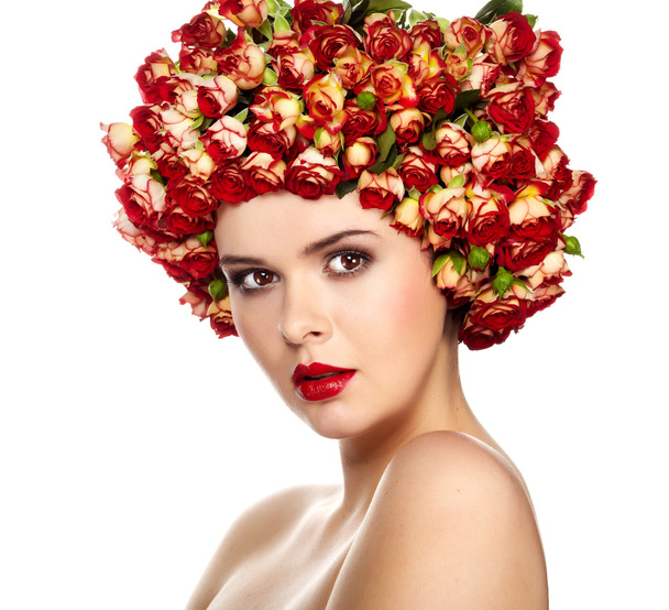 Portrait of young beautiful woman with roses in hair, on white b - Foto, immagini