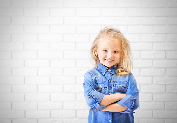Little girl in jeans suit  - Φωτογραφία, εικόνα
