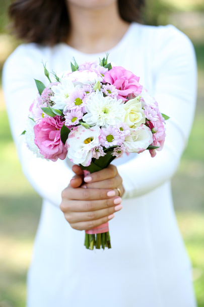 Wedding bouquet in hand - Фото, зображення