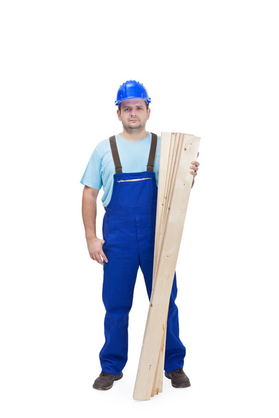 pracownik budowlany z drewna plancks - Zdjęcie, obraz