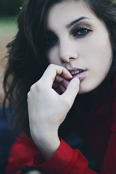Portrait of exquisite beautiful young girl in a red blouse. Beau - Foto, afbeelding