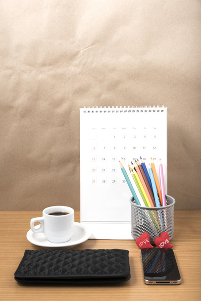 office desk : coffee with phone,wallet,calendar,heart,color penc - 写真・画像