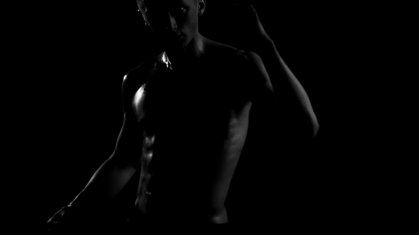 sexy dancer young male isolated on black - Imágenes, Vídeo