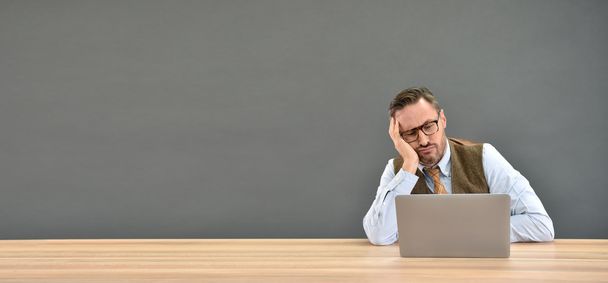 man being bored in front of laptop - Photo, image